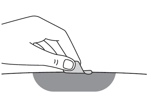 Line drawing of a hand gently lifting the edge of a gray circle on a flat white surface