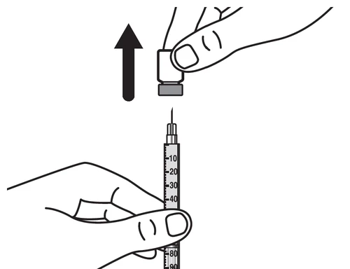 A hand lifting a protective cap upward, indicated by an arrow