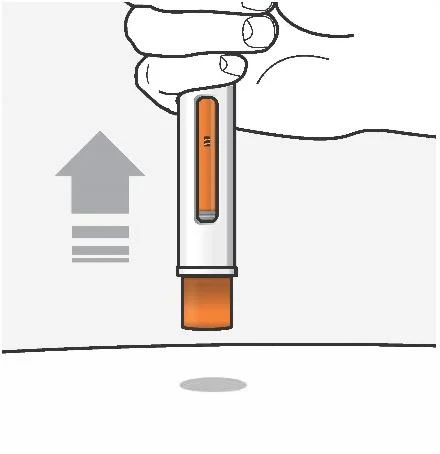 Una mano tiene verticalmente un dispositivo medico bianco con una finestra arancione sopra una superficie piana con una freccia rivolta verso l'alto