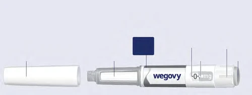Pluma inyectora Wegovy blanca y gris con indicador de dosificación y letras azules sobre fondo claro