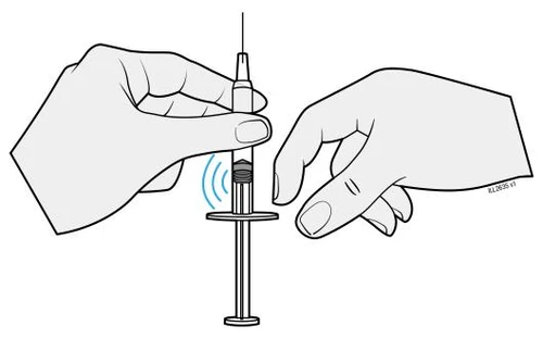Two hands handling a syringe with the needle pointing upward