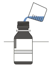 A transparent container pouring blue liquid into