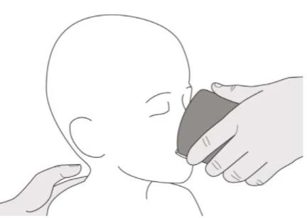 Linear drawing of a person with closed eyes holding a gray device against the face while a hand supports the neck