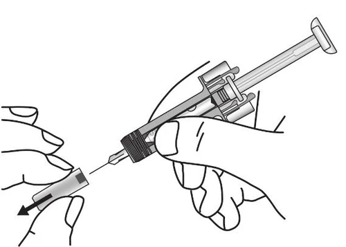 Two hands hold a syringe to connect the