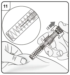 Two hands hold a spring-powered medical device above the skin with an enlargement showing the internal mechanism and the tip of the
