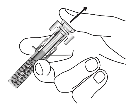 A hand holds an injection pen while the