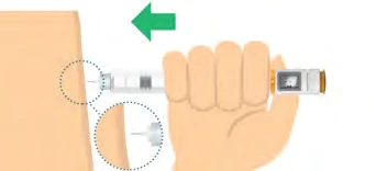 A hand holds a medical device toward the skin with a green arrow indicating the direction of movement toward the body