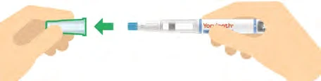 Two hands bringing an injection pen toward a green protective cap indicated by an arrow pointing to the left