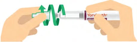 Two hands hold a pre-filled syringe Yorvikath with green arrows indicating rotational movement for drug preparation