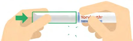 Two hands grip a white and blue medical device to separate the two parts via rotation indicated by a green arrow
