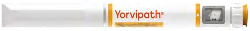 Horizontal white injection pen with orange text Yorvipath and a small rectangular window showing the internal liquid content