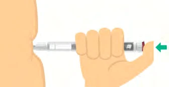 A hand holds a gray and white injection pen pressing it against a person's upper thigh with a green arrow pointing to the left