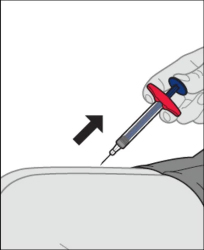 A hand holds a syringe with liquid and needle pointing downward for disposal