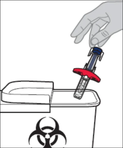 A hand inserts a medical device with a red tip into a biohazard waste container marked with the biological hazard symbol