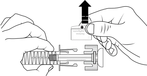 Two hands lifting a small rectangular wrapper with a black arrow pointing upward