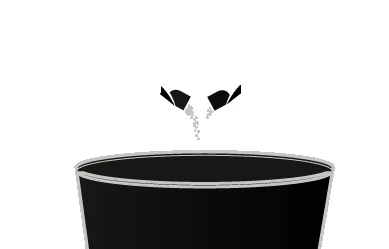 White powder pouring from an open sachet into a circular black container in a