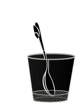 A white spoon with a long handle inserted into