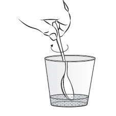 A hand holding a spoon and stirring with a rotary motion