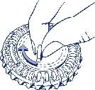 Hands rotating a round, toothed component counterclockwise, indicated by a blue curved arrow