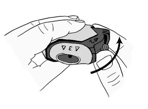 Hands holding a medical device with a black arrow indicating upward rotational movement and triangular symbols on the housing