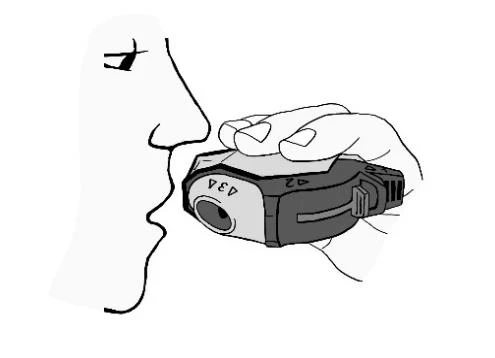 Profile of a man's face holding an inhaler at the mouth, in the form of a device for administering medication as an aerosol
