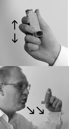 Black-and-white composite showing a hand holding an inhaler vertically and a man with glasses blowing air into the device