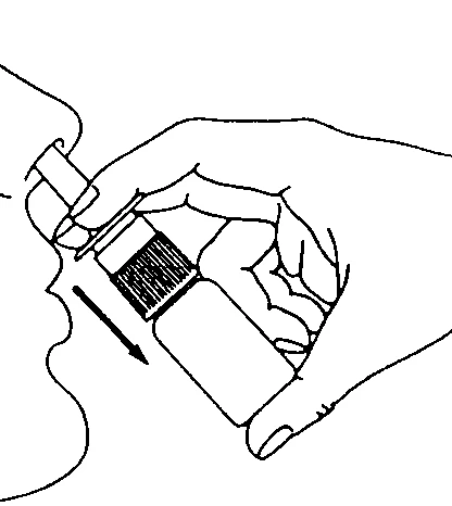 Hand holding an inhaler positioned at an angle towards a person's mouth, with an arrow indicating the direction of tilting the device towards the face