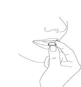 Line drawing showing a hand holding a small tablet just in front of an open mouth of a person preparing to swallow the medication