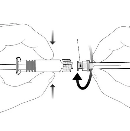 Two hands connecting two parts of the device by screwing the tip onto the barrel, suggesting an assembly or preparation process of the medication for use