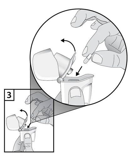 Hands opening the cap of a dispenser and placing a capsule inside, illustrating step-by-step the medication preparation process