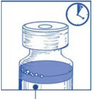 Blue schematic illustration of a vial with liquid and air bubbles, with a clock face displayed in the upper right corner indicating time