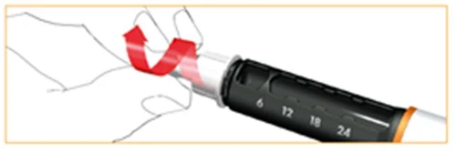 Hand holding a black injector with a scale; a red arrow indicates rotational movement of the device's nut to prepare the medication
