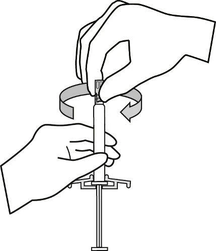 Two hands holding a syringe with needle vertically; one hand grasps the upper part, the other stabilizes the bottom of the device with a rotation arrow indicated