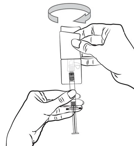 Two hands holding a syringe with a cap, the upper hand performing a rotational movement indicated by a curved arrow above the device