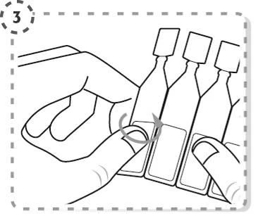 Mano sosteniendo tres frascos de medicamento, una flecha indica el movimiento giratorio realizado sobre los frascos para su preparación o apertura