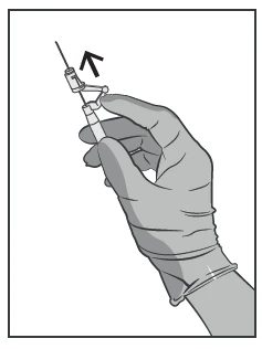 A hand wearing a glove holding a syringe, pulling the plunger upward as indicated by an arrow, to draw up medication or air