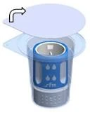 A blue cap with a black arrow indicating the direction of removal of the upper part of a blue-gray dispenser, with water droplets on the housing