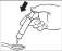 Hand holding a medical cartridge at an angle, directing the device's tip toward the skin for medication administration, with a black arrow indicating the direction of movement