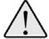Símbolo triangular de advertencia con borde grueso negro y un signo de exclamación negro sobre fondo claro que simboliza precaución o peligro