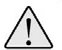 Símbolo triangular de advertencia con borde grueso negro y un signo de exclamación negro sobre fondo claro que simboliza precaución o peligro