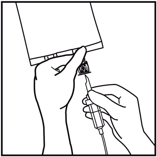 Hands holding a medication package and a pen injector with an attached needle, ready for administering the medication dose