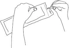 Two hands holding a rectangular package, one hand tearing the upper corner of the paper pouch to remove the contents