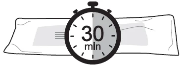 A black timer with '30 min' displayed, attached to a white, elongated object resembling a dressing or bandage on a light background