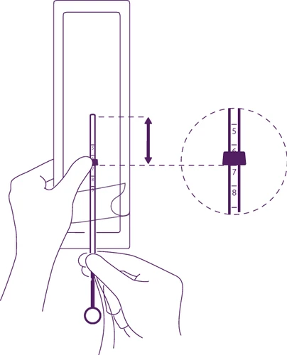 Two hands holding a vertical medical device with a slider; an enlarged section shows a numerical scale with the slider positioned at level 7