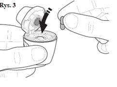 Hands holding a medical device; one hand stabilizes the housing while fingers of the other hand insert a small capsule into the opening indicated by a black arrow