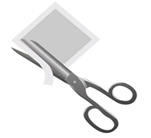 Silver scissors cutting a white sheet of paper placed diagonally on a light background