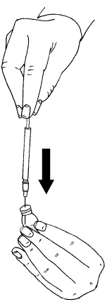 A hand holding a syringe with a needle directed vertically downward toward the opening of a small vial held by another hand