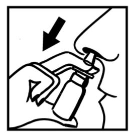 Hand holding a small atomizer and applying its tip into the nostril, indicated by a black arrow pointing downward