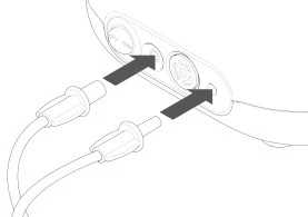 Two cables with plugs directed by arrows toward two circular sockets located on the panel of a medical device