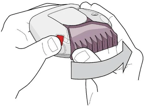 Two hands holding a white and purple medical device, with a wide gray arrow indicating a rotational movement performed on the device housing